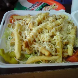 crispy chicken salad with fries and cheese