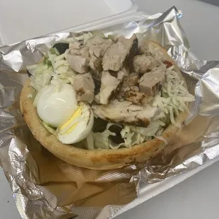 a sandwich with a hard boiled egg