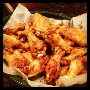 a basket of chicken wings