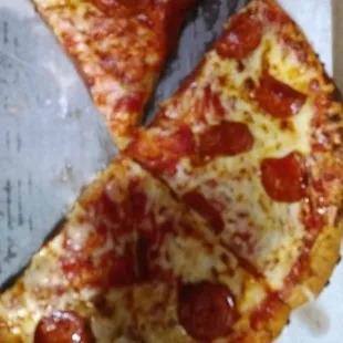 a slice of pepperoni pizza