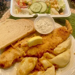 Fried Fish dinner with peroghies and salad