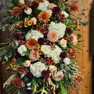 Celebration of Life - one of two large sprays that sat on either side of mom's portrait in front of the altar