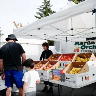 people shopping for fruit and vegetables