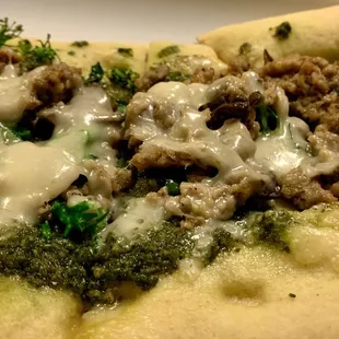 Flat bread with Italian sausage. Very good