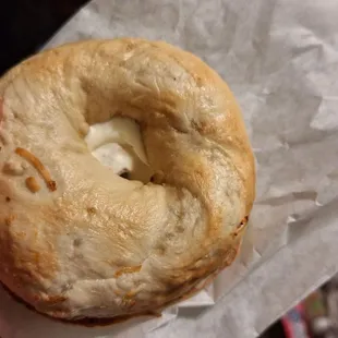 Onion bagel toasted with cream cheese