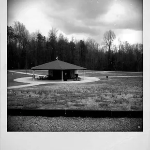 Sit, eat, relax. Trails in background woods.