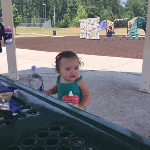 And we made it! The park is just beautiful and so thoughtfully laid out. My 14 month old enjoying snack time and then it&apos;s on!