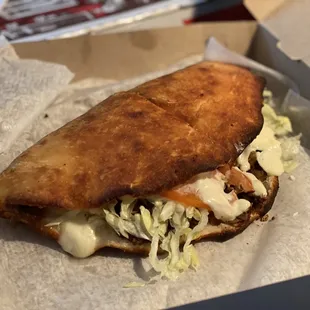 Steak and cheese wedge to-go!  Very yummy!  This is how you'll receive if it's to-go!