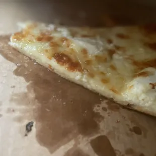 White slice pizza, not bad but gushes oil.