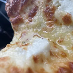 a slice of cheese pizza