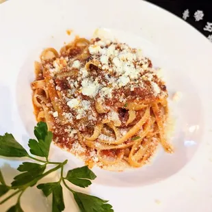 a plate of pasta and parsley