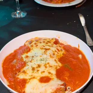 The Veal Parmesan was delicious, calamari, and this Italian steak dish, cheese wrapped into the fillet.