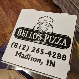 a pizza box on a table