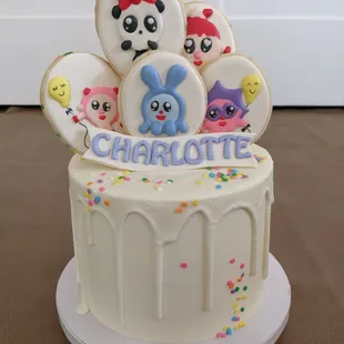 a decorated birthday cake for charlotte