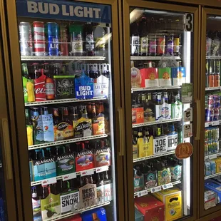 a display of beer in a cooler