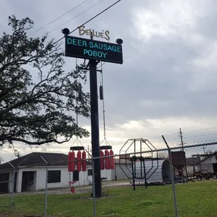 Sign post....apparently they serve deer!