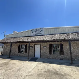 Front of the building next to the welding shop!