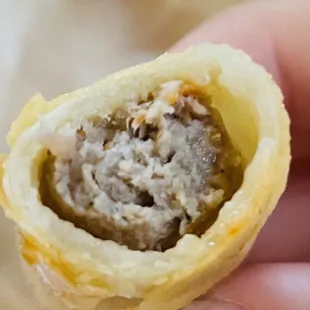 Inside the lumpia...kinda tasted like ground chicken...not sure...crisp though!