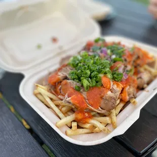 a take out container of food