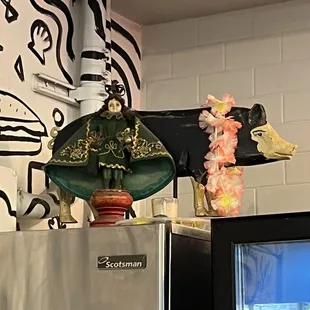 Infant Jesus of Prague watches over Belly&amp;Snout