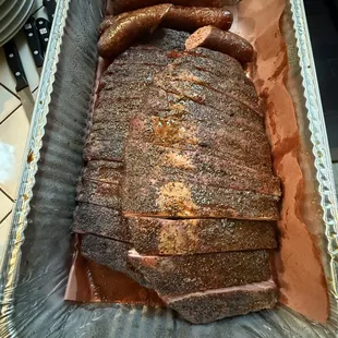 2 slabs of amazing ribs along with the tasty sausages.