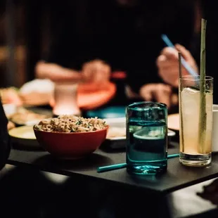 a table full of food and drinks