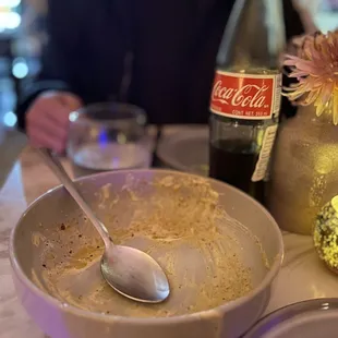 We meant to take a picture of our ceviche mixto last night, but we ate it too fast. Here&apos;s the remains of our ceviche and a Mexican Coke.