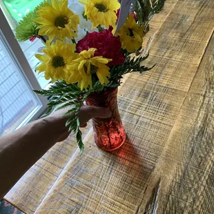I am a very petite person and have small hands. I can literally palm the vase. Very disappointed.