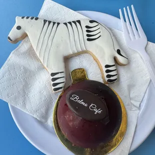 Shortbread zebra cookie and a cherry chocolate bomb.