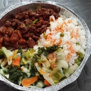 Peppered steak, sweet and sour plus veggies over rice.