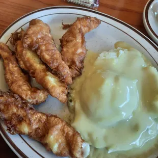 Chicken fried with mashed potatoes