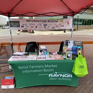  table with information booth