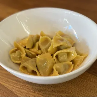 Agnolotti di Lidia: Piedmontese stuffed pasta w/beef shank, flat iron, pork loin, sausage, escarole, spinach, Grana, beef reduction