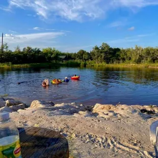 Guests taking a dip in the pond at Beloved Garden.