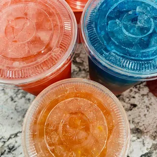 a close up of three drinks