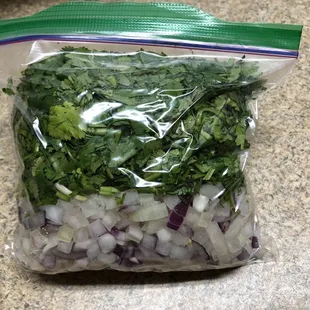 $2 extra for onions and cilantro for your tacos. Who does that? This should come with the tacos ‍