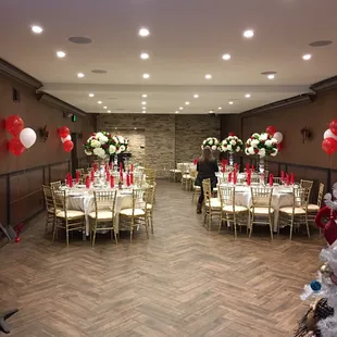 a banquet room decorated for christmas