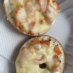 two bagels in a styrofoam container