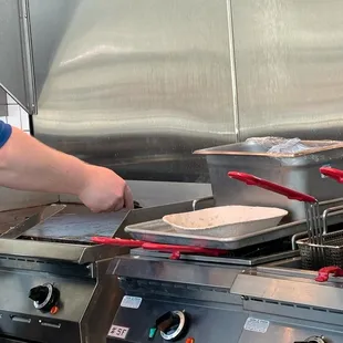 grill-master viewing from counter ...