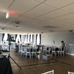 a large room with tables and chairs