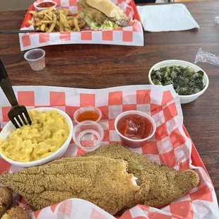 Catfish Sandwich on a Bun and Catfish Basket Turnip Greens Mac &amp; Cheese