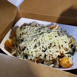 Green chile Chicken Totchos w/ Avocado Crema