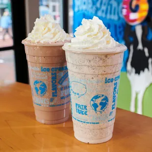 Two ice cream shakes in the Ben &amp; Jerry's ice cream shop.