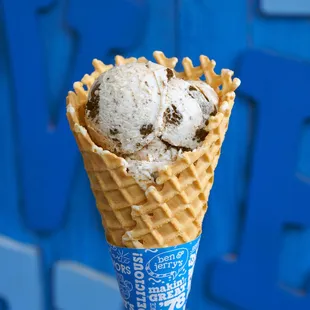 A freshly baked waffle cone in a Ben &amp; Jerry's ice cream shop.