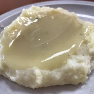 The smoothest, and tastiest mashed potatoes &amp; gravy I have ever eaten.