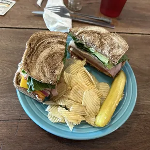 a sandwich and chips on a plate