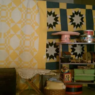 a table with a quilt on it