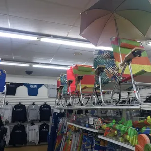 Beach towels , kites and umbrellas