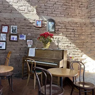 a piano in the corner of the room