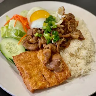com thit, hot ga, + tau hu ky (rice platter with pork, fried egg, and shrimp cake)